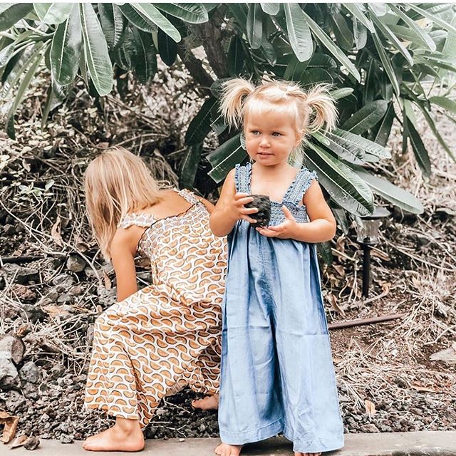 Little girls in their Pink Chicken Jumpers.