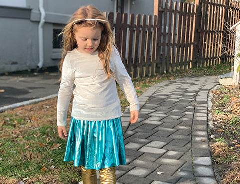 Julia walks the path in her Olivia velour top and Gianna lame skirt. Click to read the full Q&A!
