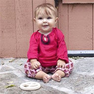 baby in pink chicken