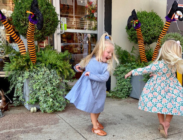 Miller and Margot dance their hearts out in their Fall Pink Chicken dresses in downtown Huntsville, AL.  Click to blog page.
