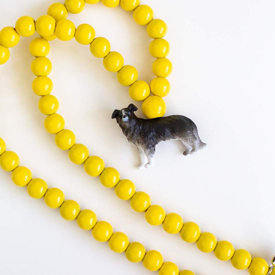 Border Collie on Yellow Beads